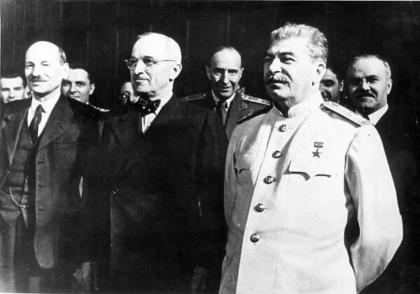 Stalin, truman, attlee (left), and molotov (right) at the berlin conference of the heads of the governments of ussr, gb and u, s, a, in 1945