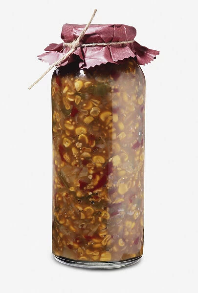 Tall glass jar of corn and pepper relish