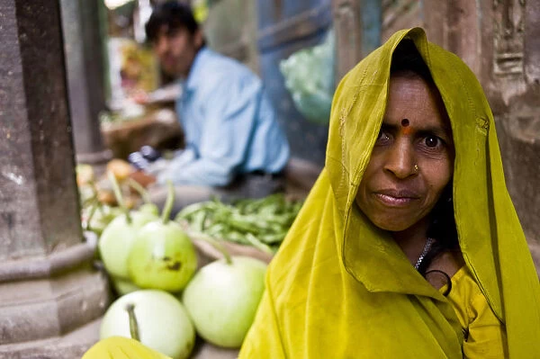 Woman at a vegetable market in Varanasi
