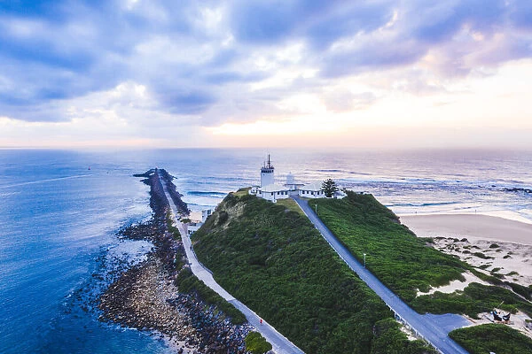 Aerial of Newcastle and Nobbys Lighthouse in Newcastle Harbour, New South Wales, Australia