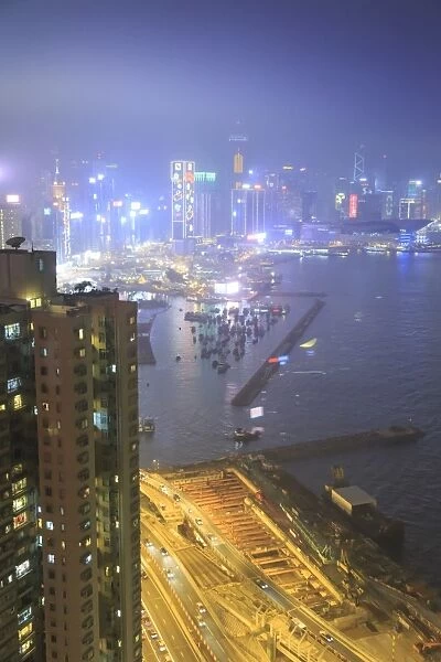 Hong Kong and Victoria harbor aerial view on a foggy night