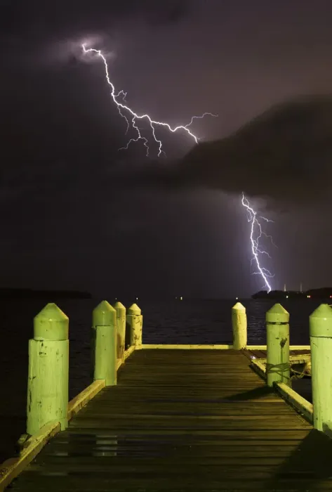 Framed Print : Print of Lightning Strikes Over a Jetty at Night Framed Print : Print of Lightning Strikes Over a Jetty at Night