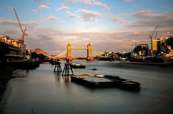 London Tower Bridge and river Thames view from London Bridge at sunset in long exposure
