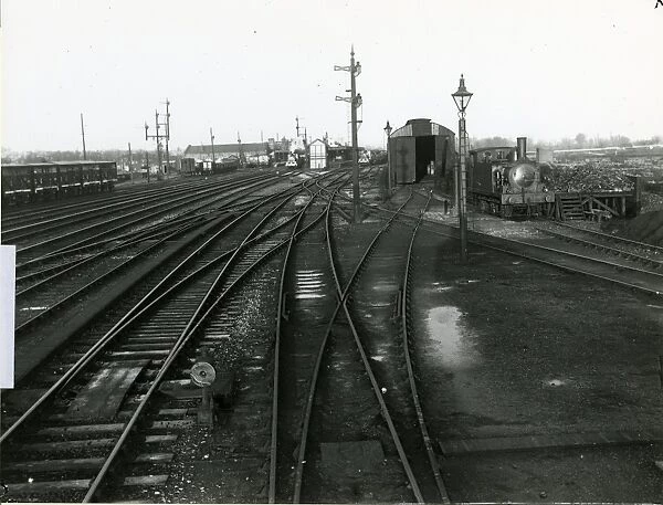 Ely station, general view of the station approaches. Corrugated iron clad engine shed