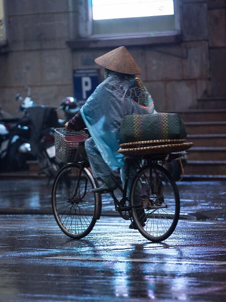 Bicycle vendor, hawker, bicycle, rain, street, vertical
