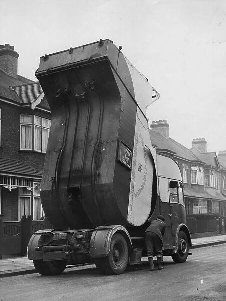 Bin Day. A dustcart in Tottenham, London, collecting rubbish