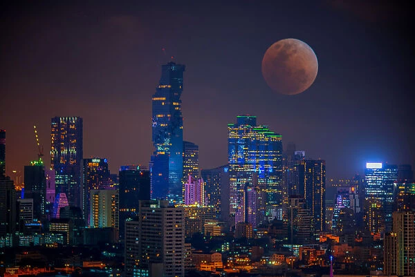 Bloody moon Bangkok night view with skyscrape