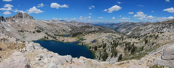 Blue lake in the granite barrens of the High Sierra