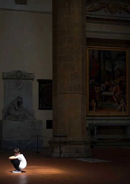 A boy in the church Santa Croce