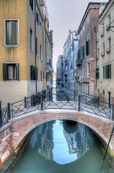 Canal with bridge in the center of Venice - Italy
