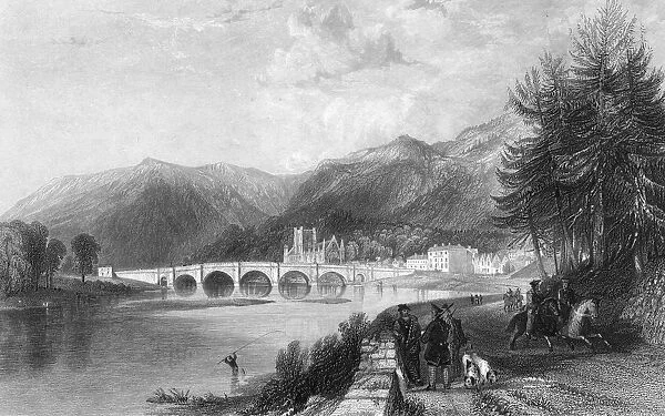 Dunkeld. circa 1800: A view of Dunkeld in Perthshire showing the bridge over the River Tay