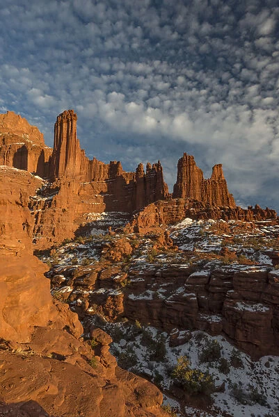 Fisher Towers with snow and clouds, near Castle Valley, Utah, USA