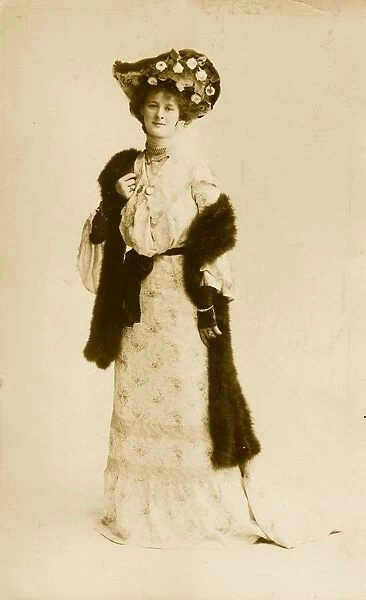 Fur Stole. 30th June 1903: Miss Mable Paul wearing a fur stole and lace mittens