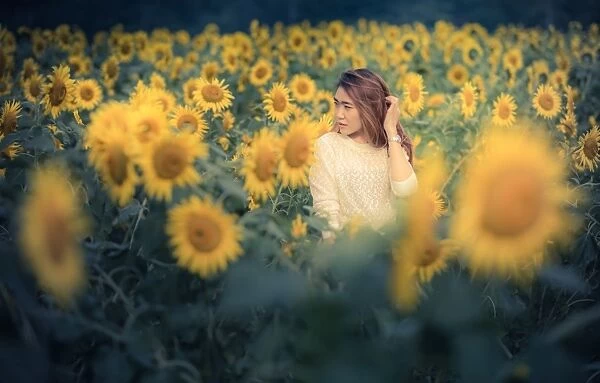 A girl in sunflower field