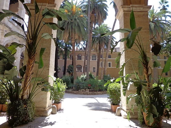 Green courtyard of the Palazzo Venezia in Rome, Italy
