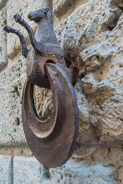 Iron ring for tethering horses. Siena, Italy