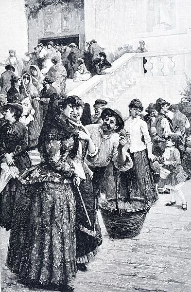 Man offering flowers to a group of young women