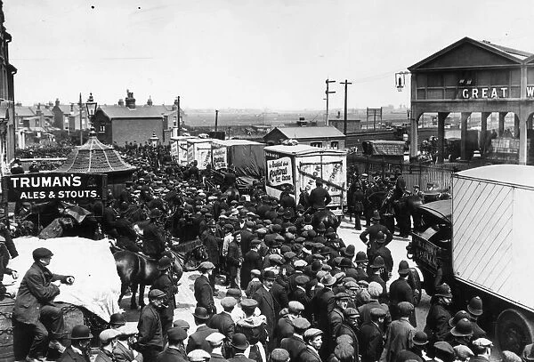 Meat Vans. 28th May 1912: Crowds demonstrating as meat vans leave Connaught