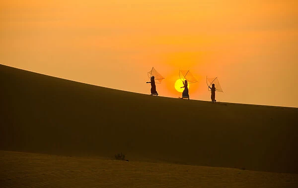 Minority Cham Girls on Sand Dune in beautiful sunsire  /  dawn