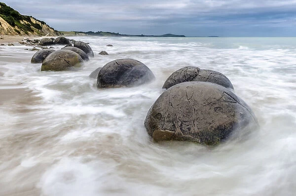 Moeraki Boulders, geological feature, round rock balls, washed by the waves of the surf at high tide, Coastal Otago, Moeraki, South Island, New Zealand, Oceania