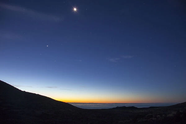 Moon and sunrise over Teide National Park