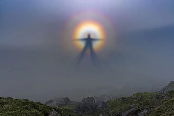 Natural phenomena, Brocken spectre on Helm Crag. Lake District National park. UK