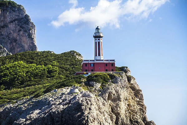 Punta Carena Lighthouse on cliff, Island of Capri, Campania, Italy