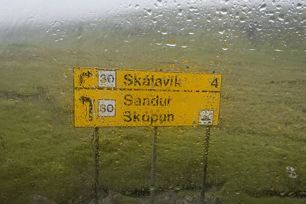 Rain on a windshield, signpost, Sandoy, Faroe Islands, Denmark