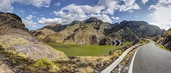 Road at the Embalse Presa del Parralillo reservoir, also called the green lake, in the mountains of Caldera de Tejeda, also called a petrified storm, Artenara Region, Gran Canaria, Canary Islands, Spain, Europe, PublicGround