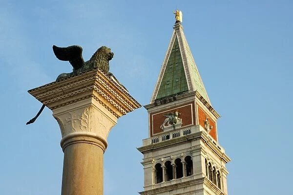 San Marco clocktower, column of the lion of Saint Mark, Piazzetta, Venice Italy