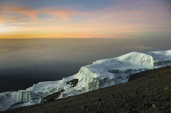 Scenic sunrise view of glaciers at Uhuru Peak, Kibo, Mount Kilimanjaro, Kilimanjaro Region, Tanzania