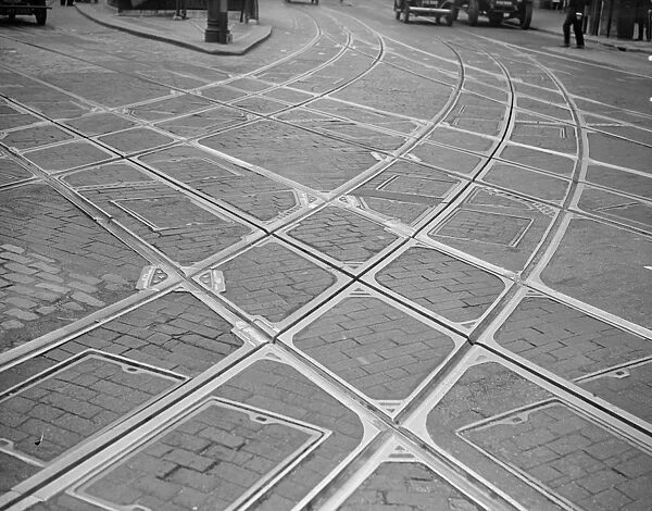 Tramlines. 1938: Tramlines at the junction of Archway Road