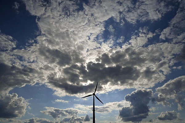 tratocumulus and a wind turbine as a silhouette, Karsberg, Upper Franconia, Bavaria, Germany