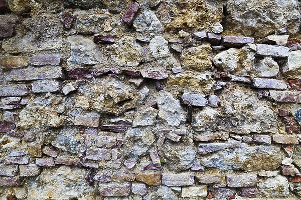 Weathered stone wall, brick wall
