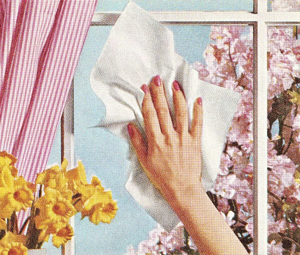 Womans Hand Cleaning Window