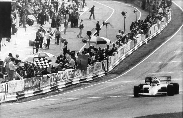 Brands Hatch, July 21st Austrias Niki Lauda takes the chequered flag to win the