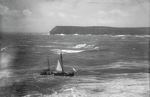 Fishing boat in rough sea approaching the Camel Estuary, Padstow, Cornwall. Early 1900s