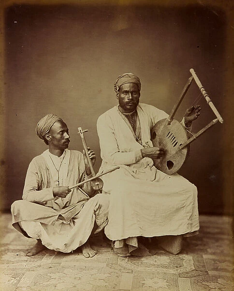 Album 'Damas et Baalbek ': Pair of Syrian musicians photographed while playing a stringed instrument