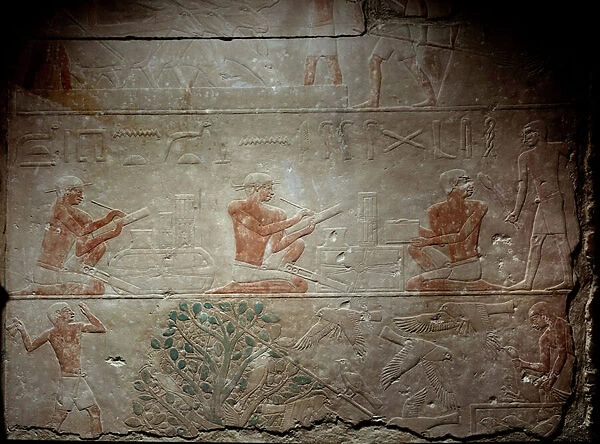 Ancient Egypt: limestone relief depicting scribes from the Chapel of Mastaba in