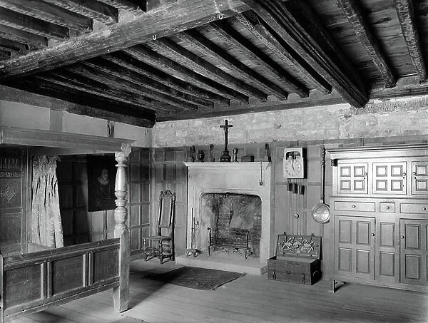 A bedroom at Snowshill Manor, Gloucestershire, from Country Houses of the Cotswolds (b / w photo)