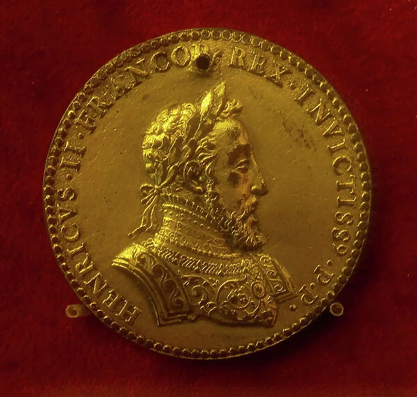 Coin depicting Henry II, King of France by Etienne Delanne (metal)
