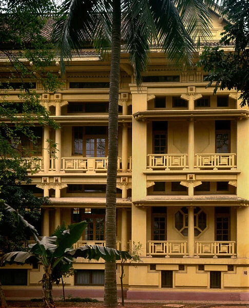Colonial architecture in Vietnam: Detail of the facade of the Musee Louis Finot, named after the first director of the Ecole Francaise d Extreme Orient, built in 1927 by architect Ernest Hebrard, now the Museum of History of Vietnam. Saigon