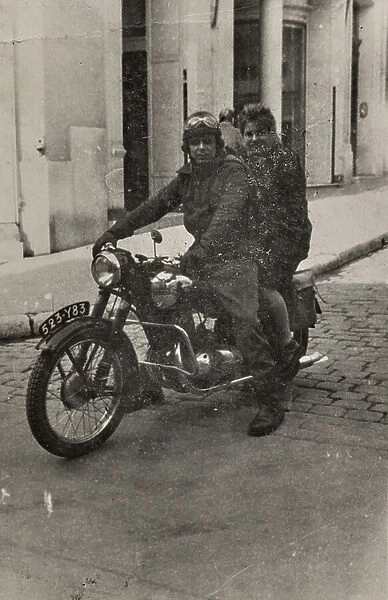 A couple on a motorcycle