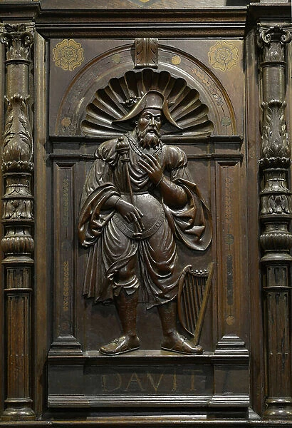 David, holding a sceptre, with his lyre at his feet - Stalls of carved wood of Jube (1535) of the cathedrale Notre Dame (1525-1535) of Saint Bertrand de Comminges (Haute Garonne, Midi Pyrenees)
