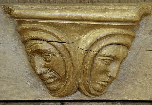 Double faces. 15th century stall adorned with Misericordes de l'abbey Saint Pierre (12th-18th century) in Chezal-Benoit (Chezal Benoit), Cher (18160), Centre, France. Photography 2010