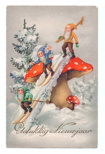 Edwardian postcard of three gnomes in the snow sliding down a large mushroom, c
