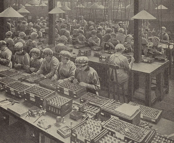 English women munitions workers assembling fuses (b  /  w photo)