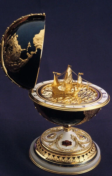 Faberge egg in the shape of a globe with a model of a ship inside (columbus ?)