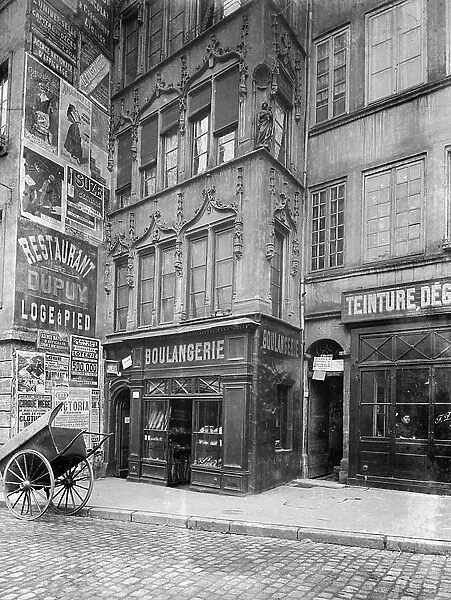 France, Rhone-Alpes, Rhone (69), Lyon: rue Lainerie with shops and Gothic buildings with corner statue of the Holy Virgin, 1904 - shops: glazing of all kinds J Pedrinis, attic of abundance groceries counter, grease dye