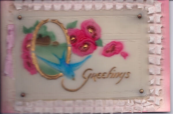 A greeting card made of plastic with a swallow and a threaded ribbon